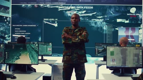 Figures in a High-Tech Military Control Room