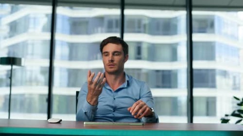 Man Touching Virtual Screen Getting Holographic Projection of Data Close Up