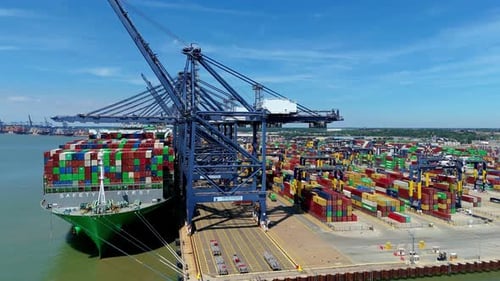 Aerial view of docks and cargo ship, United Kingdom.