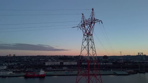 High Voltage Power Lines at Sunsethigh Voltage Electric Transmission Tower