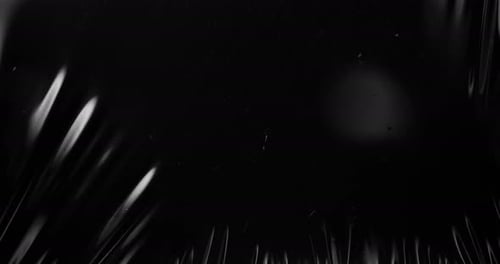 Animated Texture Undulates on Dark Background