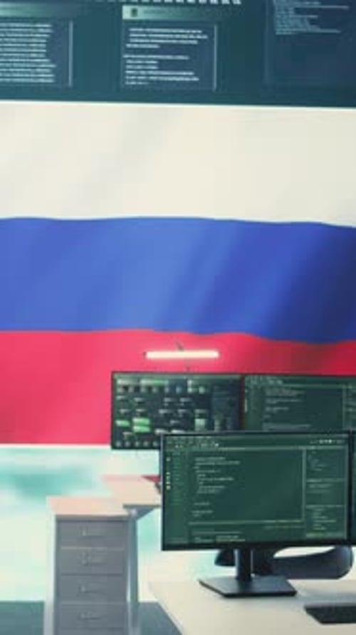 Office Workplace with Computers and Russia Flag