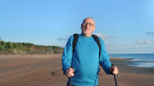 Portrait Smiling Old Man Backpacker Nordic Walking Stick Posing at Sunny Sea Sand Beach