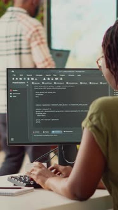 Woman Working as Software Developer in Office