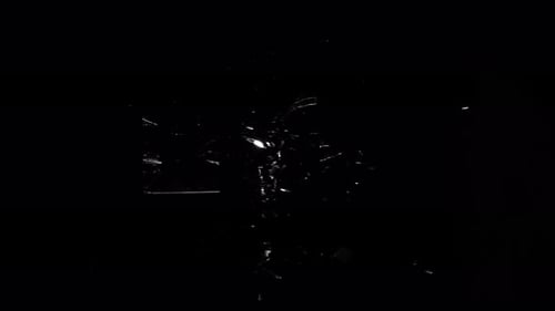 Fragment Collection: Effect of a window glass shattering from a brick on a black screen