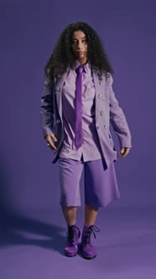 Stylish Biracial Model Posing for Fashion Magazine Cover in Photo Studio