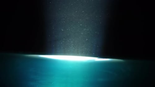 Underwater Depth with Floating Particles