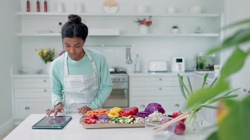 Couple Prepping Vegetables in Bright Kitchen