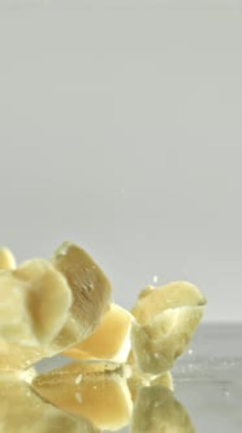 Super Slow Motion Pieces of White Chocolate Filmed on a Highspeed Camera at 1000 Fps