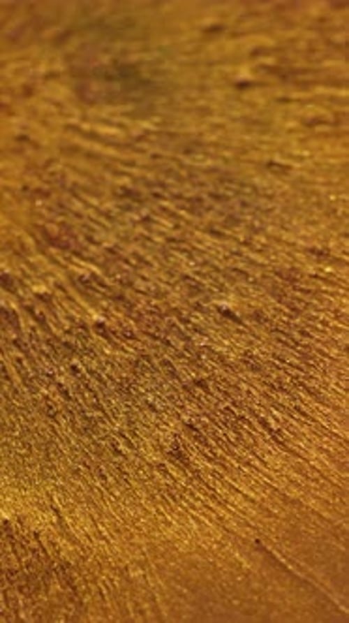 Sparkling Abstract Gold Liquid Flowing