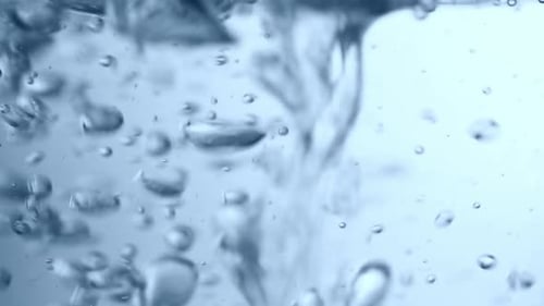 Dynamic Water Bubbles Rising in a Close-Up Shot