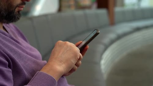 Close Up of Male Hands Hold Mobile Phone Social Media Surfing Internet