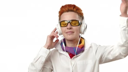 RedHaired Lesbian Enjoying Music with Headphones on White Background