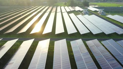 Aerial view of solar panels stand in a row landscape electrical power