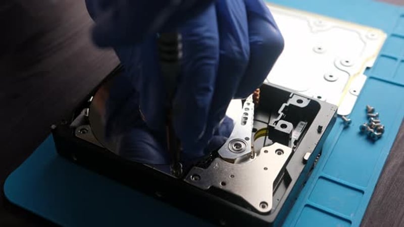 Computer Technician Opening Package With New Hard Disk Drive For ...