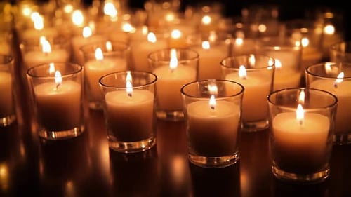 Rows of candles in a church or temple.