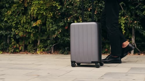 Tourist Man with Suitcase Baggage in Spain A Traveler with Luggage Suit Jacket on Business Street Go
