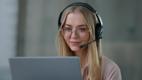 Caucasian Business Woman in Headset Talking Video Call with Laptop in Office Girl Female