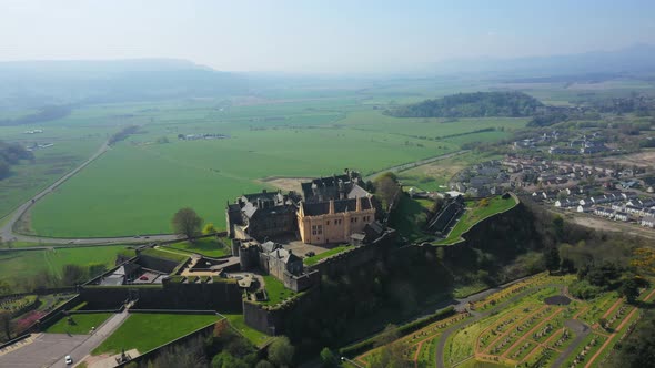 4K Aerial Shot Panning Around Stirling Castle From Behind Buildings 4k-aerial-shot-panning-around-stirling-castle-from-behind-buildings