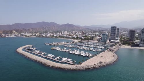 Marina in the Caribbean sea, Port of Santa Marta in Colombia, aerial orbiting