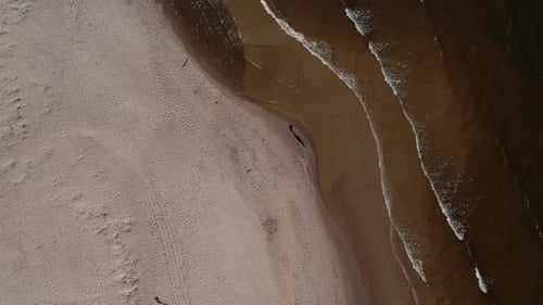 Drone Aerial View of Waves Sea Ocean Coast Beach and Dunes Dark Calm Sea Waves Nature Landscape