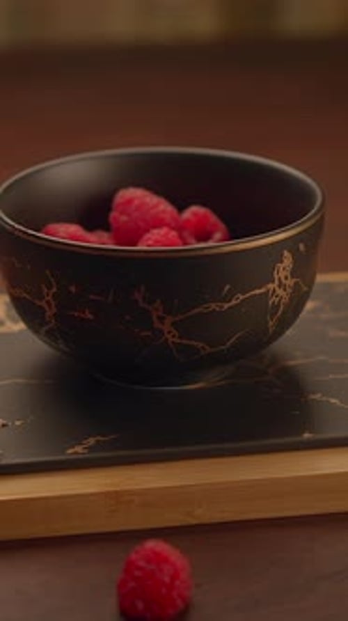 Fresh Raspberries in Decorative Bowl Close Up