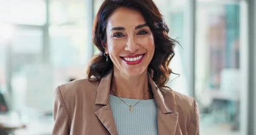 Happy, office and face of business woman with company pride, confidence and laugh for joke