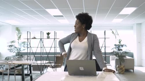 Confident Businesswoman Working at Laptop in Coworking Space Office Adult