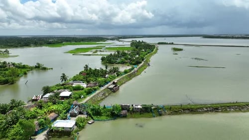 Rural coastal village, agricultural fields submerged in flood, Satkhira region, Bangladesh, Aerial