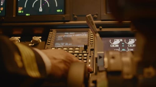Captain Inserting Destination Coordinates on Cabin Dashboard