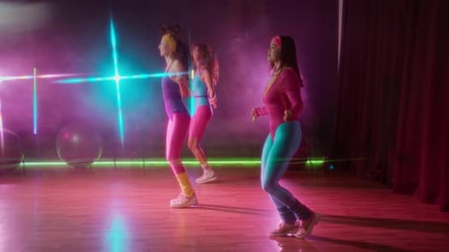 Women Doing 80s Aerobics in Retro Fitness Class