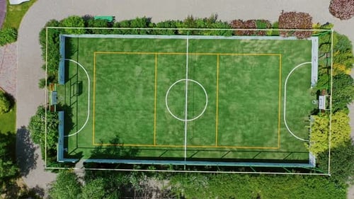Small football pitch. Modern sportsground of the recreation complex among nature.