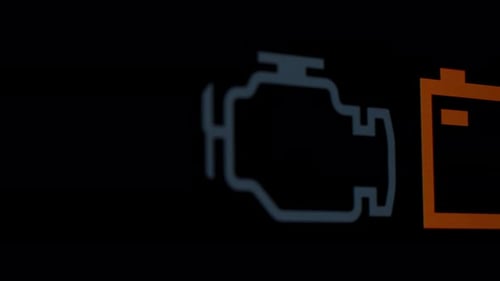 Illuminated Dashboard Warning Lights in Close Up