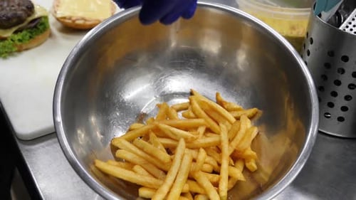 French Fries Placed in a Bowl in a Kitchen