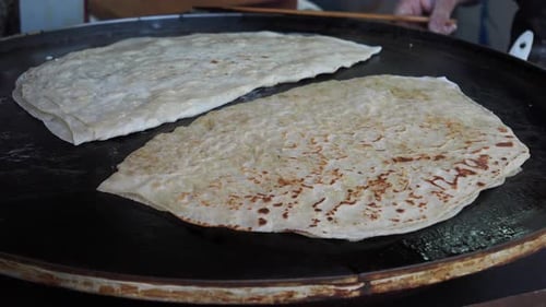 Cooking Turkish Food Pita Bread is Cooked on the Street