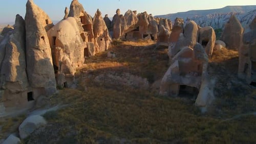 A Captivating Aerial Stock Video of the Cappadocia Region in Turkey Valleys with Houses Gracefully