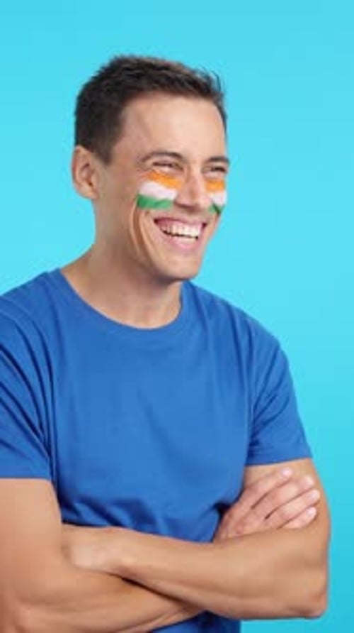 Smiling Young Adult Portrait on Blue Background