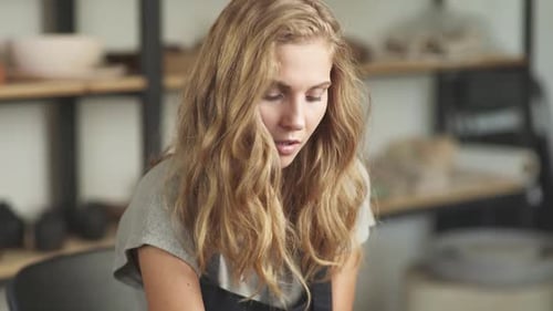 Woman Working on Crafting Project in Art Studio