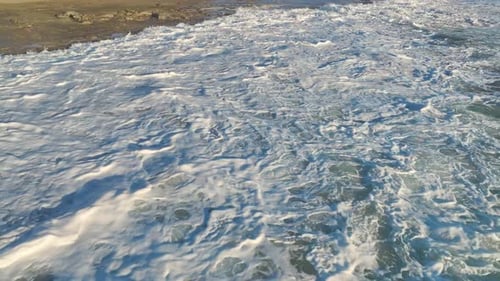 Crashing Waves Aerial View of Coastal Beach