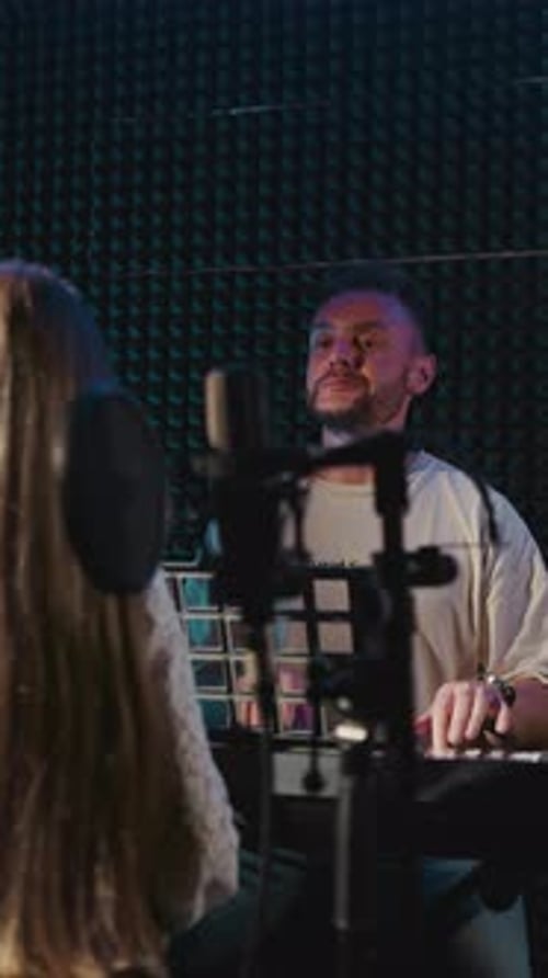 Mentor Practices Song with Child in Studio