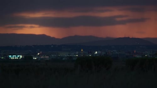 City on the Background of the Sunset Sky