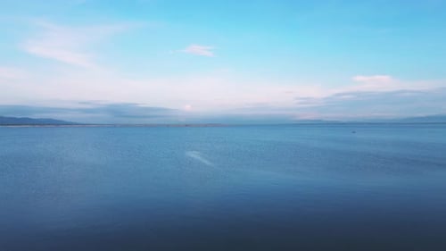 Calm lakescape Under Blue Sky