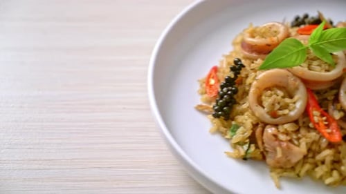 Spicy Squid Stir Fry on a White Plate