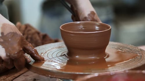 Working With Clay In Ceramic Workshop 14