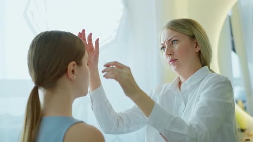 Makeup Artist Work in Her Beauty Studio Portrait of Woman Applying By Professional Make Up Master