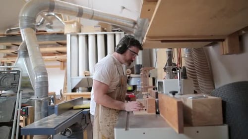 Carpenter Using Table Saw in Workshop 3539 Years