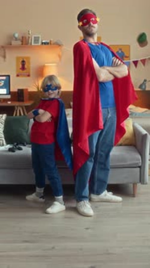 Father and Child Dress Up as Superheroes