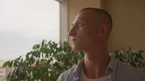 Close Up Portrait of Man Looking at Window