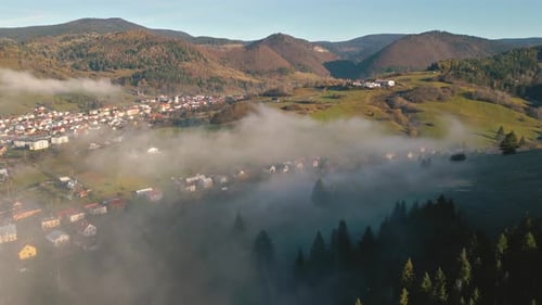 Aerial View Of Misty Europe Countryside in Autumn Morning Landscape