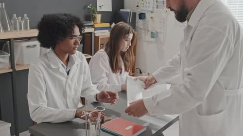 Students Analyzing Data in Science Laboratory
